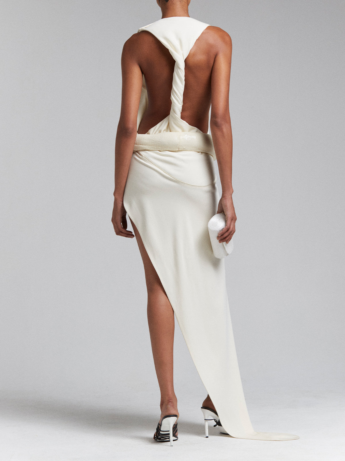 ASYMMETRICAL TWISTED GOWN IN CREAM